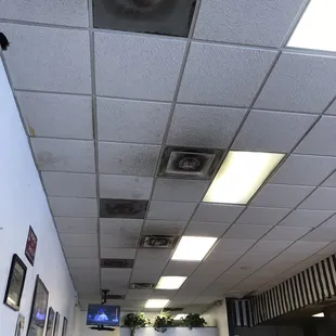 Not sure if this is a ceiling in a place that serves food or repairs vehicles. Oh sorry, it&apos;s university diner