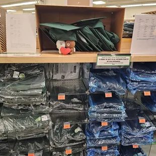 Graduation caps, hoods, and gowns...