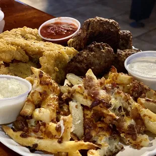 Sampler: loaded fries (bacon and cheese), meatballs, and chicken tenders