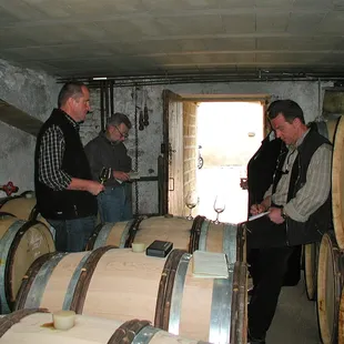 a group of men in a cellar