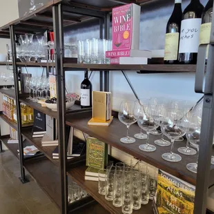 a shelf of wine glasses