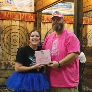 a man and a woman posing for a picture
