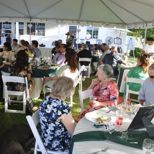 Backyard reception under the canopy