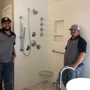 Freddie and Robert installers with Unlimited Plumbing