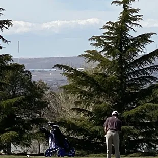 My son playing at UNM Championship golf course.