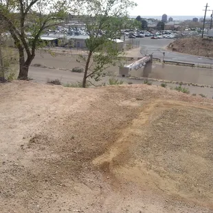 The current updated trail ought to continue down that hill.