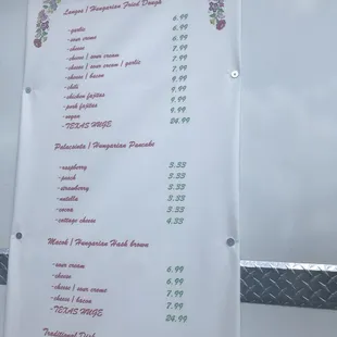 a menu on a food truck