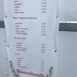 a menu on a food truck