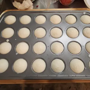 Baby Idly - small muffins. Twice the size of small ldly that goes into &apos;14 Idly&apos; - a signature dish of South India (in a bath of Sambar)