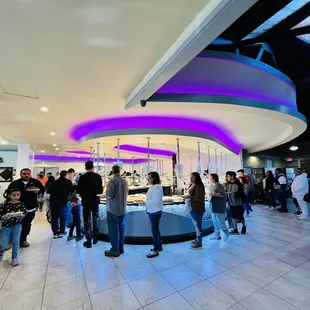 a group of people standing in a line