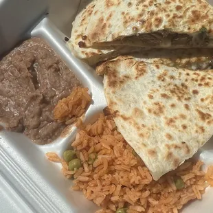a meal in a styrofoam container