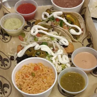 3 tacos rice and beans cobo with your choice of sauce