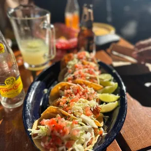 a plate of tacos on a table