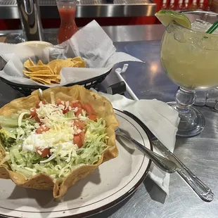 Taco salad, chips and margarita