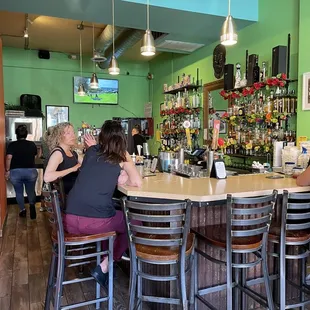 people sitting at the bar