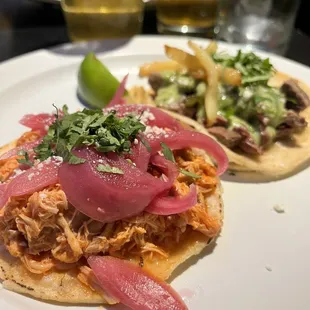 Carnitas and steak tacos