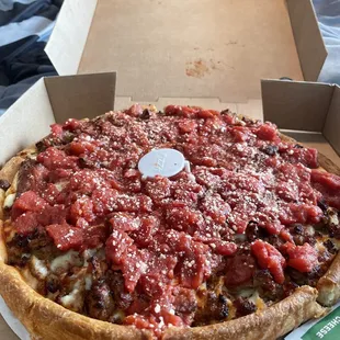 Deep dish Chicago pizza. Extra cheese, extra sauce. Yummy :)
