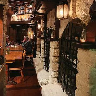 a man sitting at a table in a restaurant