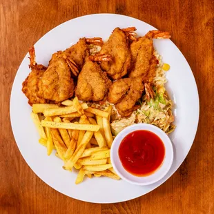 a plate of fried fish and fries