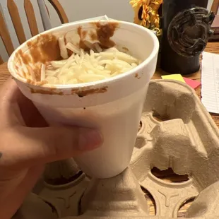 side of Beans comes in a cup, the cheese was 75 cents