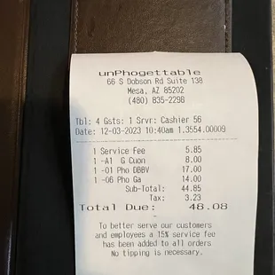 a receipt on a wallet