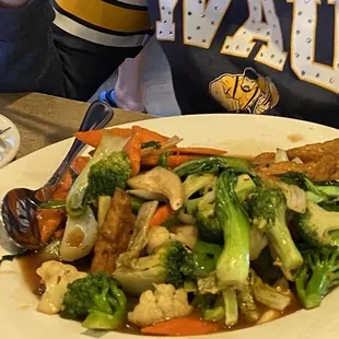 Vegetarian dish huge portions serve with jasmine rice that was not edible