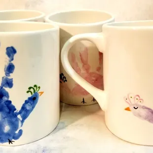 Handprint mugs.
