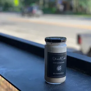 a candle on a window sill