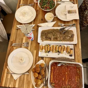 Arancini with Roasted Garlic Aioli, Veal Marsala, Eggplant Caponata, Cannolis.