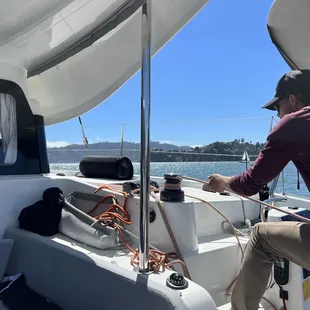 Captain getting sails ready.