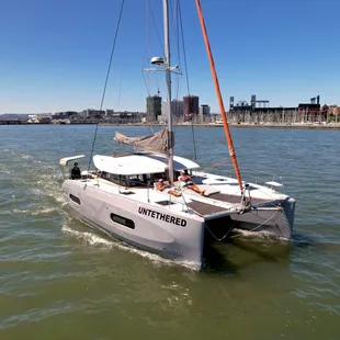 Untethered in action with guests lounging on the day beds