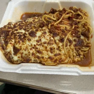Baked spaghetti with cheese . I opted out of the toast that normally comes with it. Enough for two people.