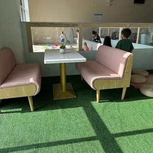 Seating next to but outside play area