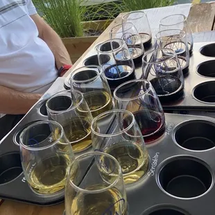 a tray of wine glasses