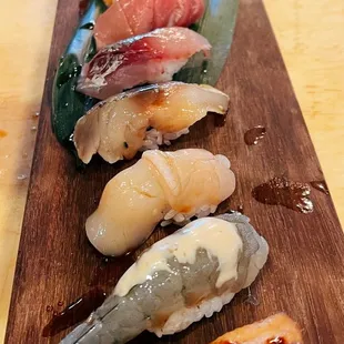 sushi on a wooden board