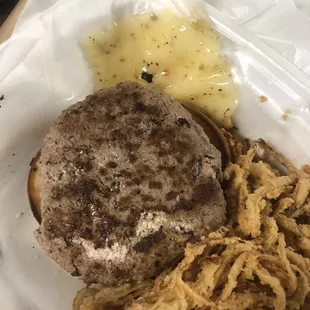 a hamburger and onion rings