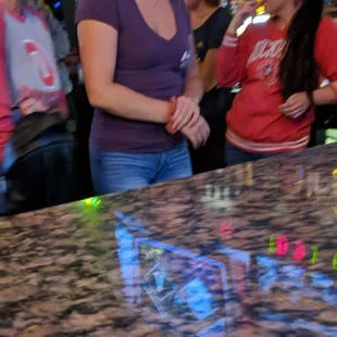 Standing around not taking care of patrons.