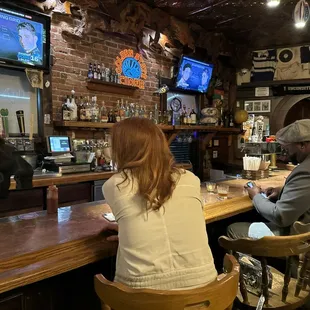 people sitting at the bar