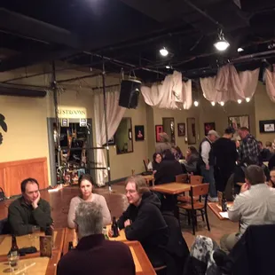 a group of people sitting at tables