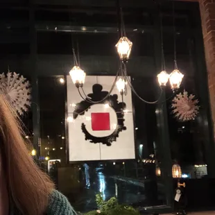 a woman in front of a window