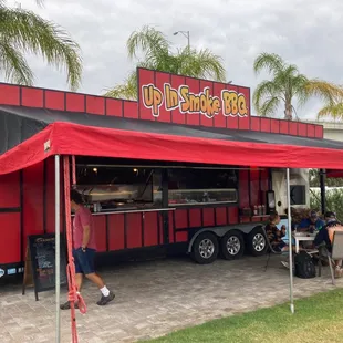 a red and black food truck