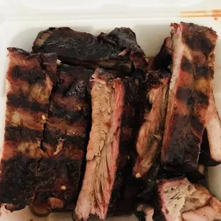 ribs in a styrofoam container