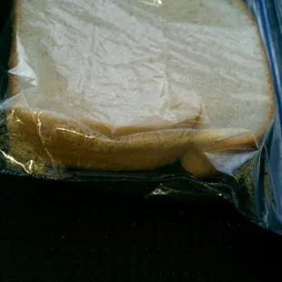 2 slices of white bread, soft as cotton