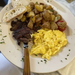 steak and eggs with fried potatoes