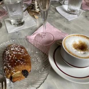 A little bubbly, pain au chocolate, and cappuccino.