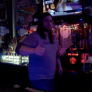 a man giving a thumbs up