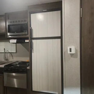 Installed a bigger refrigerator and had to remove the top cabinet