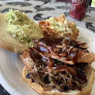 Jumbo pork sandwich with potato salad.