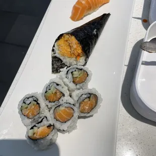 Salmon cucumber roll and spicy crab hand roll