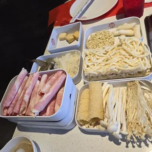 Meats and side items for hot pot